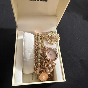 Anne Klein Gold Bracelet Watch with Blush Pink Dial and Floral Charms